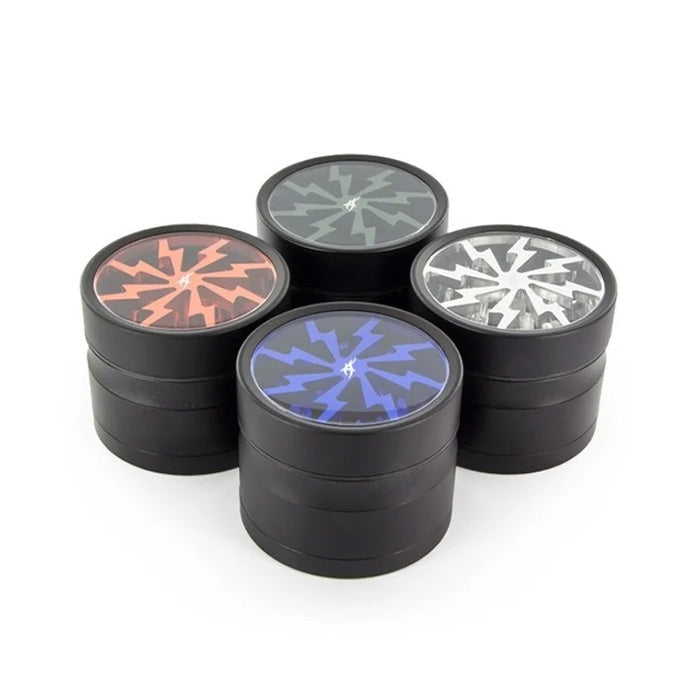 Close-up of all 4 AfterGrow Thorinder 1 grinders (orange, blue, green, gray) together, standing upright.