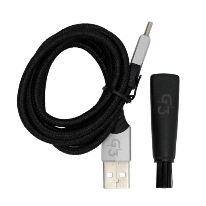 Close-up of the Chewy G3 Electronic Grinder Basic Edition Black charging cable and cleaning brush, highlighting the details.