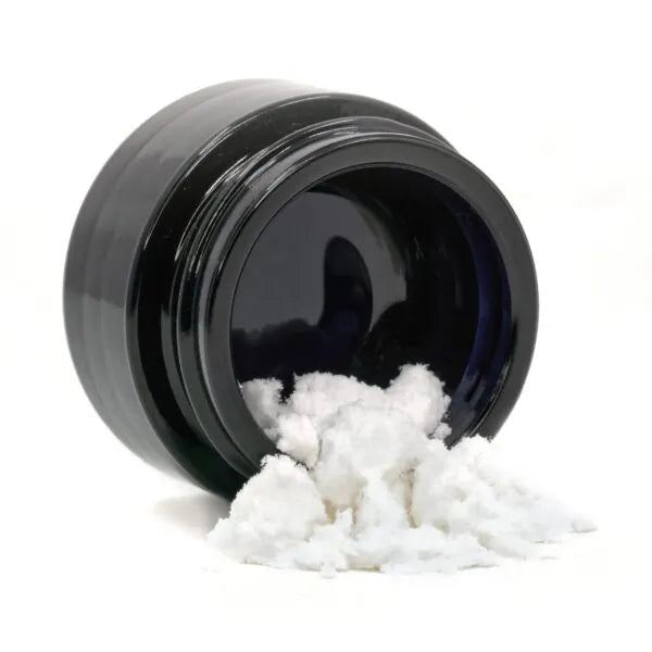 Close-up of Happease CBD Extracts ICE Isolate 99.7% CBD jar with product visible.
