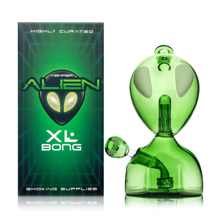 Hemper Alien XL Bong 9.1″ with matching illustrated box, featuring an extraterrestrial-inspired design with glowing green details and a sleek glass finish.