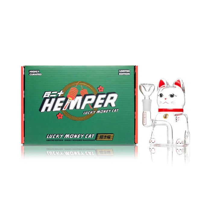 Hemper Lucky Money Cat Bong standing alongside its packaging.