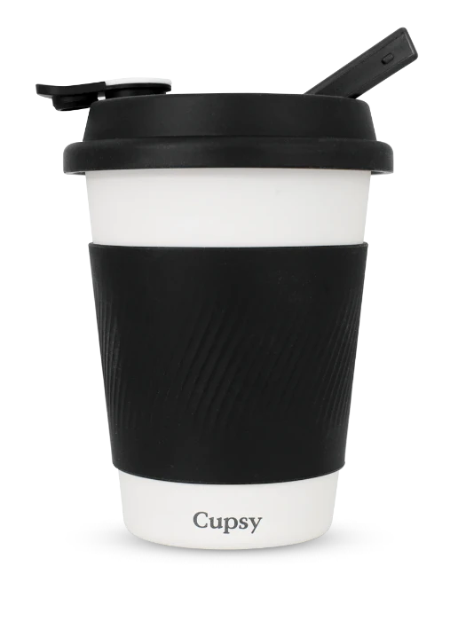 Puffco Cupsy Coffee Cup Bong standing with mouthpiece raised.