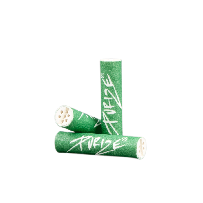 Close-up of loose Purize XTRA Slim 50 Green filter tips, highlighting their slim and clean design.