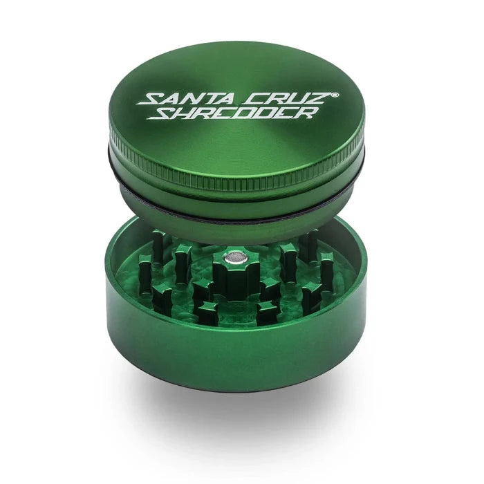 Santa Cruz Shredder® Metal 2 Parts 54mm Green Grinder, open, posed flat to show interior.