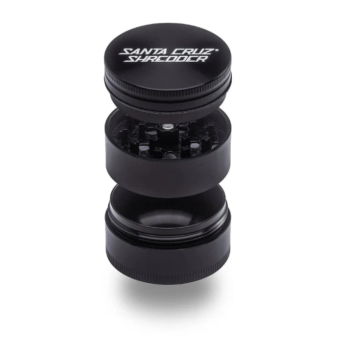 Santa Cruz Shredder® Metal 3 Parts 54mm Black Grinder, open, posed flat to show interior.