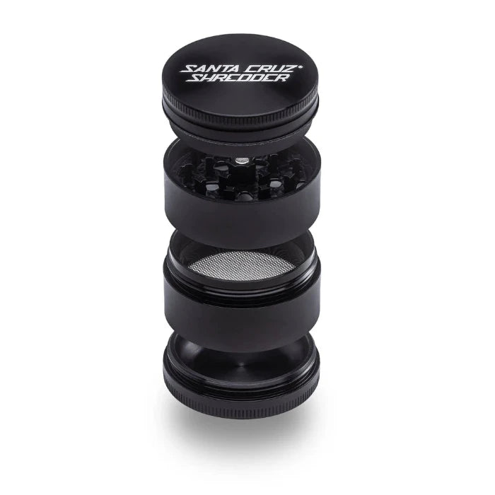 Santa Cruz Shredder® Metal 4 Parts 54mm Black Grinder, open, posed flat to show interior.