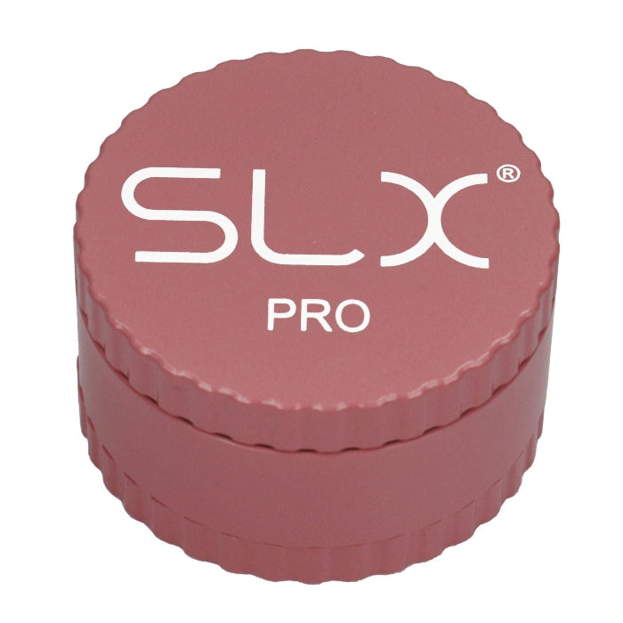SLX Pro Aluminium Non-Sticky Grinder 62 mm Pink standing upright.