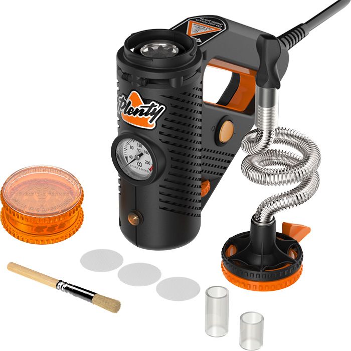 Storz & Bickel Plenty Vaporizer, slight angled view with all accessories around.