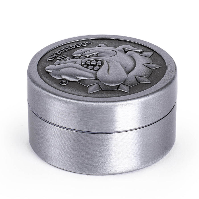 The Bulldog® Original Worldwide 2 Parts 40mm Metal Grinder, closed and placed flat.