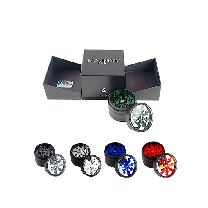 Thorinder Mini box with grinders in front, in green, black, grey, blue, and red.
