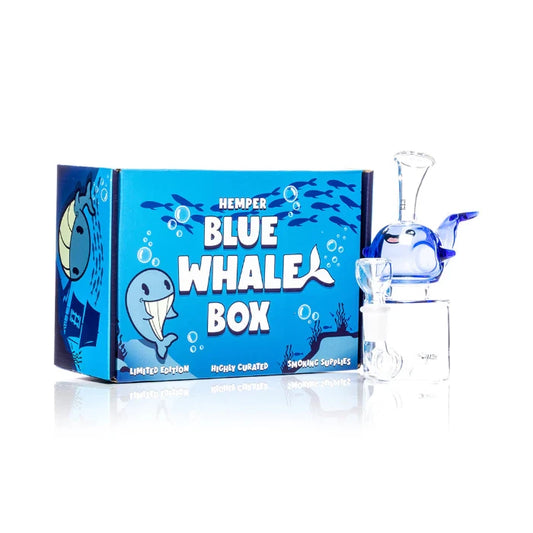 Hemper Blue Whale Bong 6.5″ with matching illustrated box, shaped like a playful blue whale with detailed fins and spout.