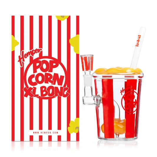 Hemper Popcorn XL Bong 9″ with matching illustrated box, featuring a fun popcorn-shaped glass bong with colorful and playful design for a unique smoking experience.