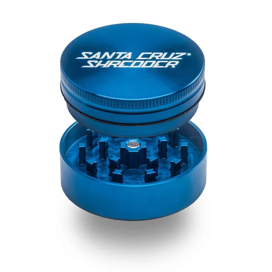 Santa Cruz Shredder® Metal 2 Parts 54mm Blue Grinder, open, posed flat to show interior.