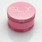 SLX 2.5 Aluminium Non-Sticky Grinder 50 mm Pink standing upright.
